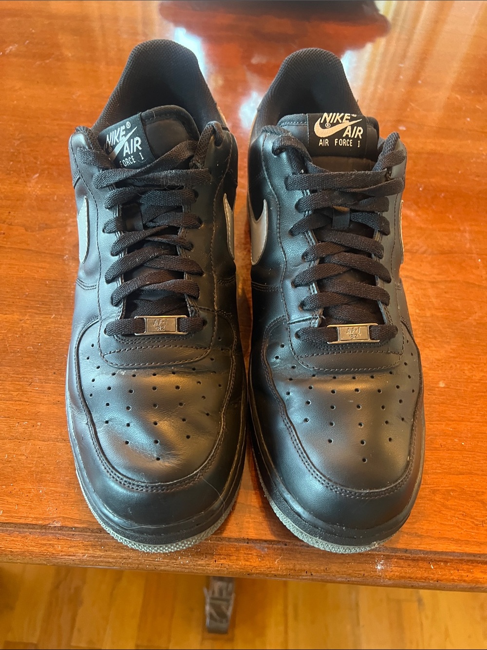 mens lightly used AF 1s triple black w/ grey swoop in mens 13